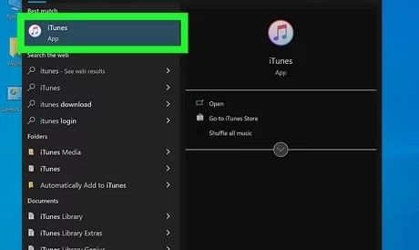 Abra “iTunes” en la PC